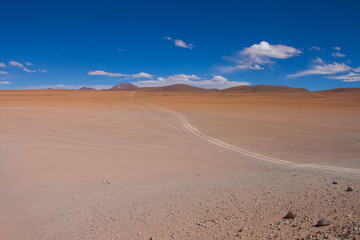Desert and mountain over blue sky and white clouds on Altiplano,Bolivia Chile 