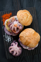 Burgers with spanish galician style octopuses, high angle view