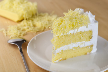 piece of cake with whip cream and grated cheese topping,selectiv