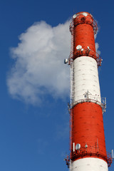 Smoke rising from an industrial chimney