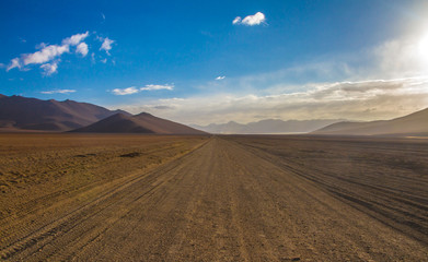 Desert and mountain over blue sky and white clouds on Altiplano,Bolivia Chile