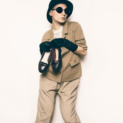 Funny Vintage Fashion Model. Beige classic costume and stylish A