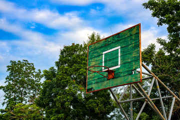 Old basketball hoop in the countryside 