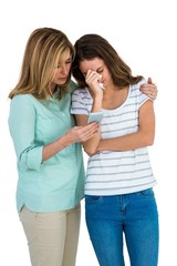 Mother comforting her daughter