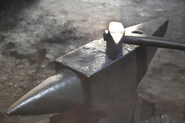 Hand anvil. hummers, all blacksmith tools in forge.