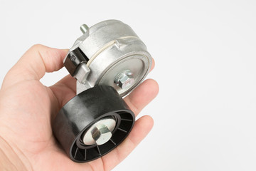 Car belt tensioner roller isolated over white