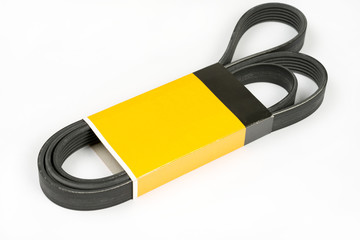 Car engine tensioner belt over white background