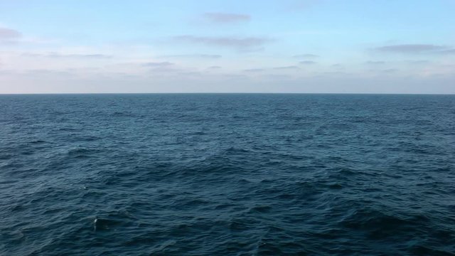 moving over the ocean. Recorded at 1080/50p for smooth slow motion when converted to 25p