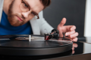 Close up guy with gramophone
