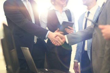 Business people shaking hands