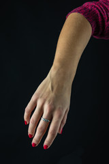 Fototapeta premium human hand showing signs. isolated on black