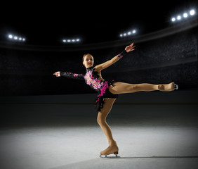 Fototapeta na wymiar Young girl figure skater