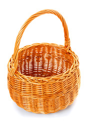 empty wicker basket on white
