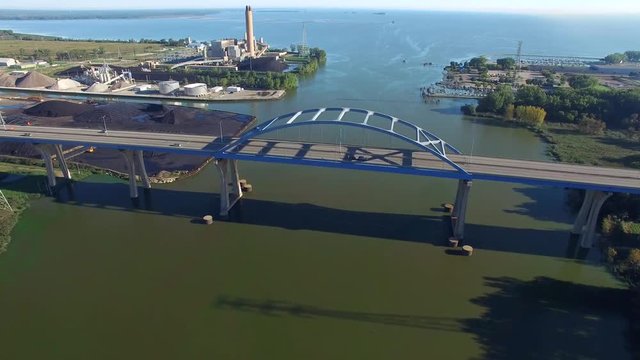 Scenic Leo Frigo Memorial Bridge in Green Bay, Wisconsin. AKA, Tower Drive Bridge.  Aerial flyover looking North toward the bay of Green Bay.