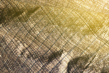 Fototapeta premium the canvas sunscreen, the camp tent fabric silver color, for traveling outdoor accommodation, temporary store, and background