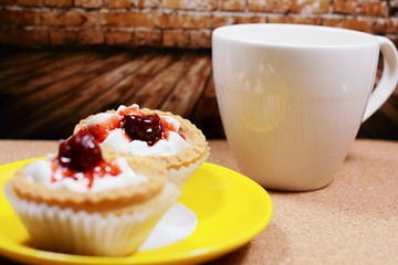 Mini Blueberry Cheesecakes with cup of Hot Chocolateใ