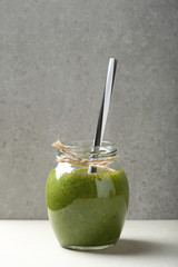 Green protein cocktail in jar