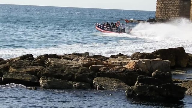 Extreme boat trip. Ako port waters, Mediterranean Sea