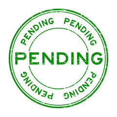 Grunge green pending round rubber stamp for business , decision