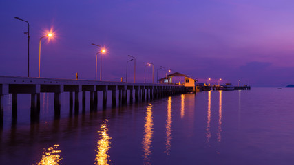 Obraz na płótnie Canvas twilight landscape of pier on the sea.at sattahip beach,Chonburi,Thailand.