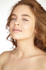 Naklejka premium Beautiful portrait of young girl with perfect skin