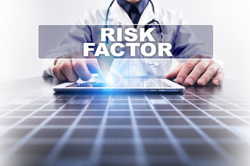 Medical doctor working with modern computer and selecting risk factor. Medical concept.