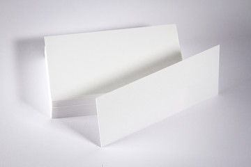 Stack of blank business card on white background