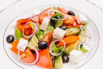 Salad with feta cheese and sun-dried olives