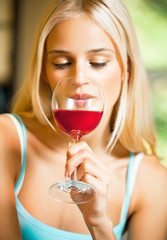 woman with glass of red wine