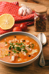 Fish soup with tomatoes and garlic (aljotta). 