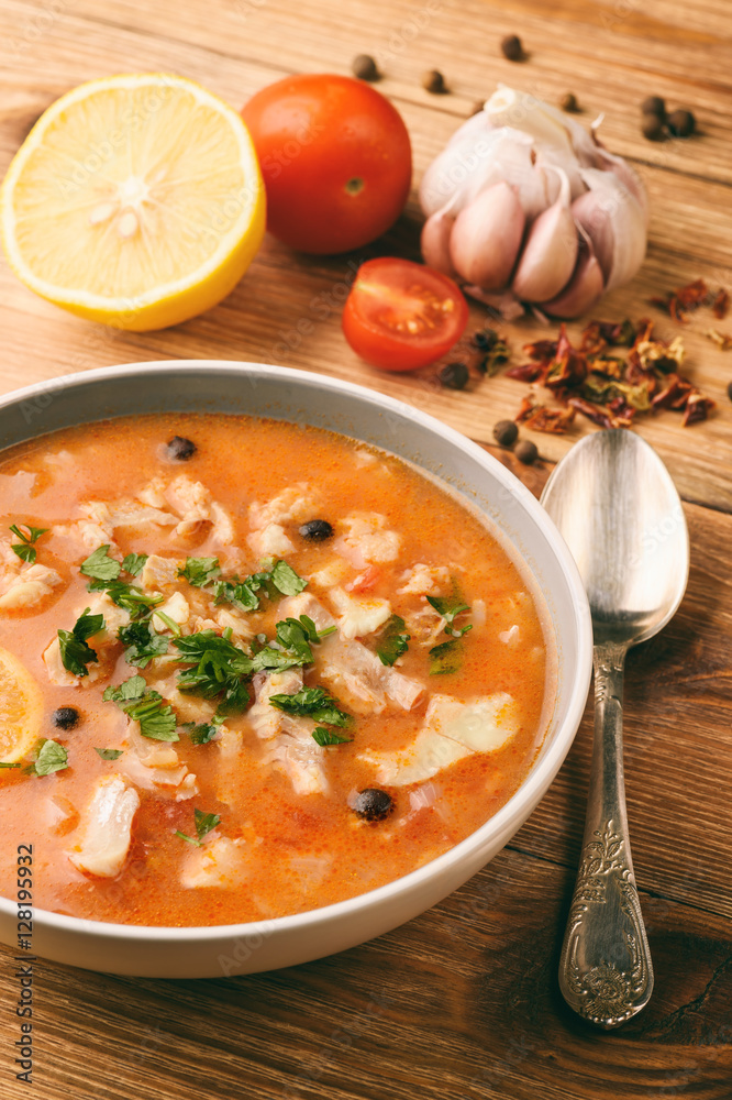 Wall mural Fish soup with tomatoes and garlic (aljotta). 