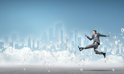 Businessman jumping high