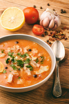 Fish soup with tomatoes and garlic (aljotta). 