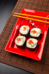 still life - set the rolls on a red plate