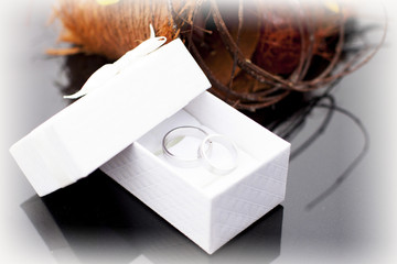 wedding rings in a white box 