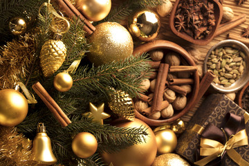 Christmas theme. Presents on a wooden table. Golden and brownish aesthetics.