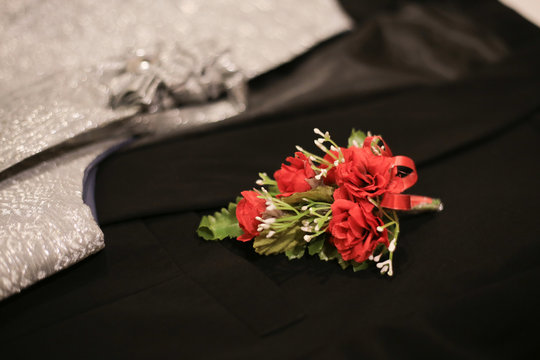 Corsage Boutonniere Brooch On A Man Groom Suit On Wedding Day.