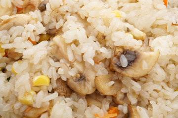 Chinese food. Rice with mushrooms and vegetables
