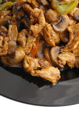 Chinese dish. Chicken with mushrooms and vegetables