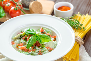 Ravioli pasta from green dough stuffing