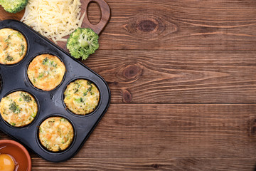 Delicious egg muffins broccoli and cheese. Concept of cooking.