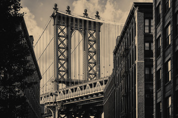 Vintage look - The Manhattan Bridge and an old Brooklyn street  in New York City