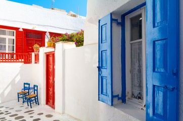 whitewashed narrow street on Mykonos island, Cyclades, Greece