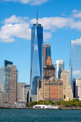 Fototapeta premium The skyline of lower Manhattan seen from the New York Harbor