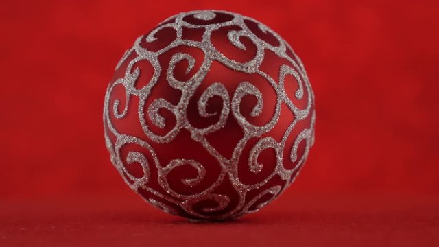 Red ball on red background