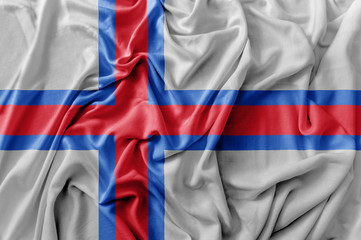 Ruffled waving Faroe Islands flag