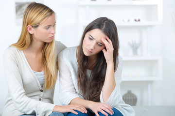 teen girl consoling her sad friend © auremar