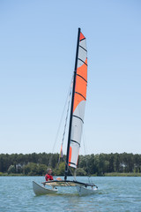 Fototapeta premium sailing on a lake - summer and sports theme