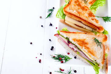 breakfast with club sandwich and juice