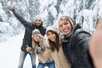 Man Taking Selfie Photo Friends Smile Snow Forest Young People Group Outdoor Winter Pine Woods